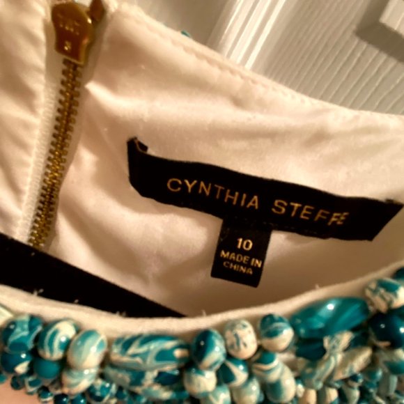 Formal White Stretch Dress with Turquoise Beaded Trim and Long Sleeves - Picture 3 of 3